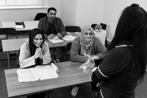 People learning in classroom