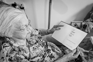 Resident, Rita Rawling with her favourite book