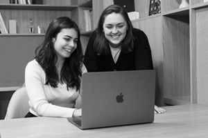 Two ladies on laptop